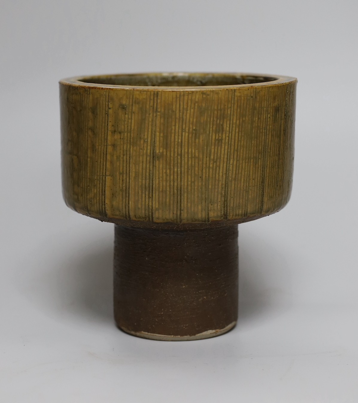 Ruth Sulke - two studio glazed stoneware ‘mushroom’ vases, together with a small studio pottery jardiniere, tallest 21cm